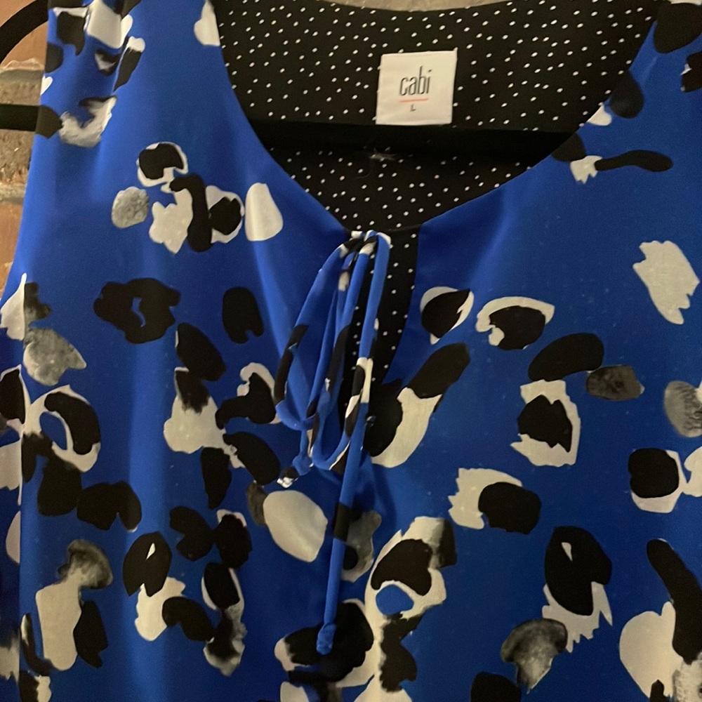 Turn Their Heads in this sassy yet sophisticated Cabi asymmetrical dress!